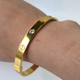 SCREW AND STONE HINGED BANGLE