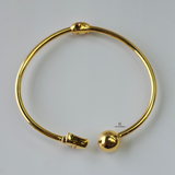 ELEGANT TRIANGLE AND BALL CUFF BANGLE