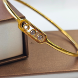 3 DIAMANTE MOVE HINGED BANGLE