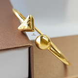 ELEGANT TRIANGLE AND BALL CUFF BANGLE