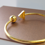 ELEGANT TRIANGLE AND BALL CUFF BANGLE