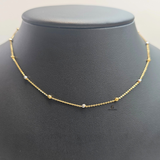 GOLD AND RHODIUM BEADED CHAIN