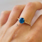 6 CLAW ROUND BLUE TOPAZ RING