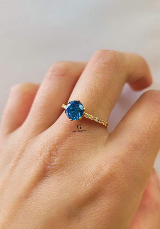 6 CLAW ROUND BLUE TOPAZ RING