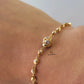 GOLD BRACELET WITH CUBIC ZIRCONIA STONE BALL