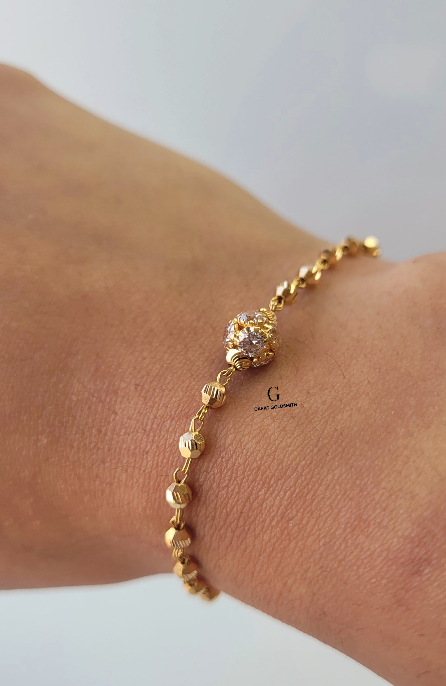 GOLD BRACELET WITH CUBIC ZIRCONIA STONE BALL