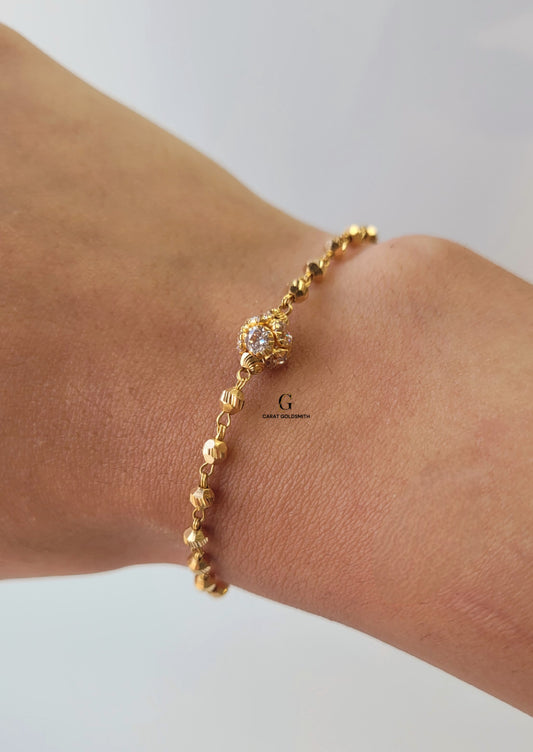 GOLD BRACELET WITH CUBIC ZIRCONIA STONE BALL