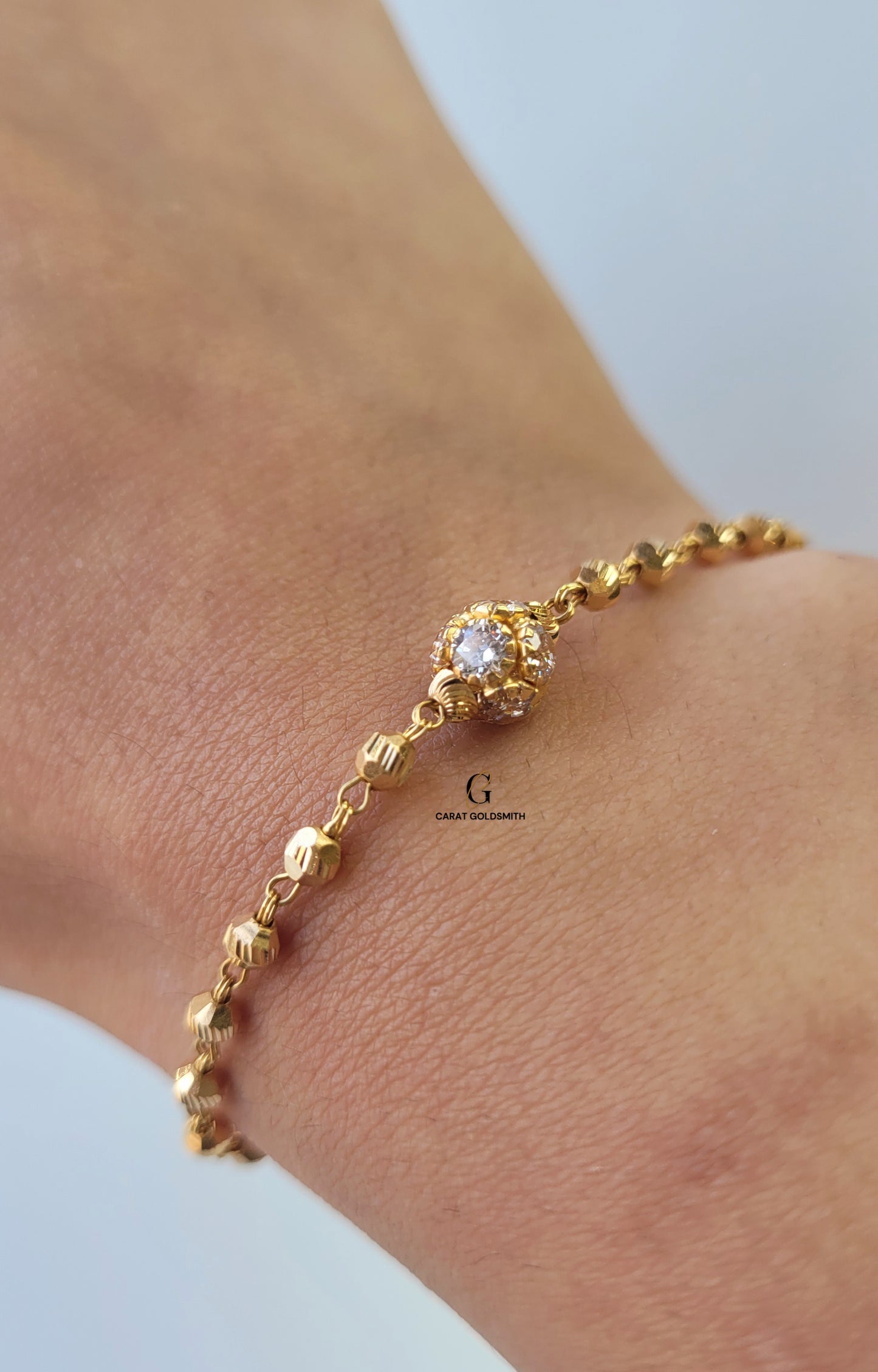 GOLD BRACELET WITH CUBIC ZIRCONIA STONE BALL