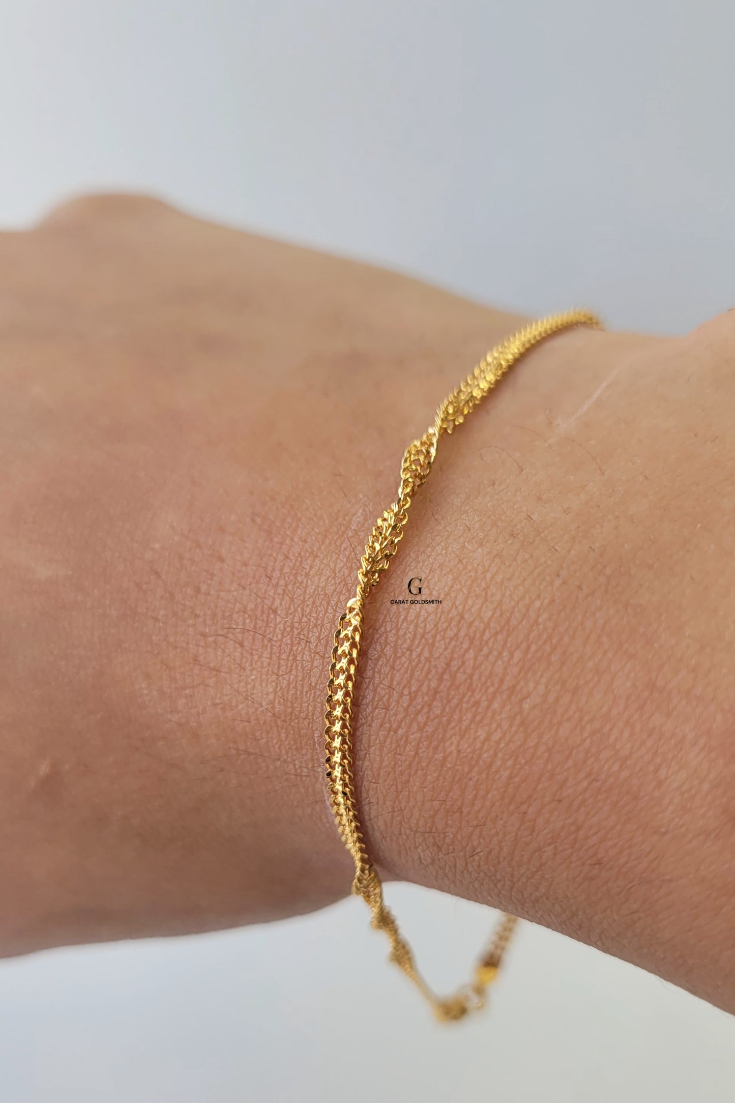 TWISTED GOLD BRACELET