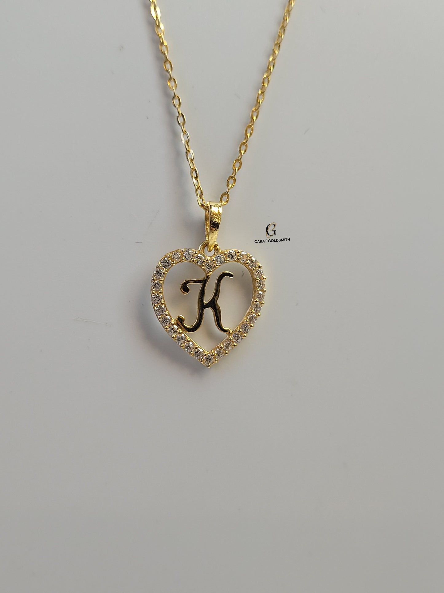 K STONE SCRIPT INITIAL HEART PENDANT