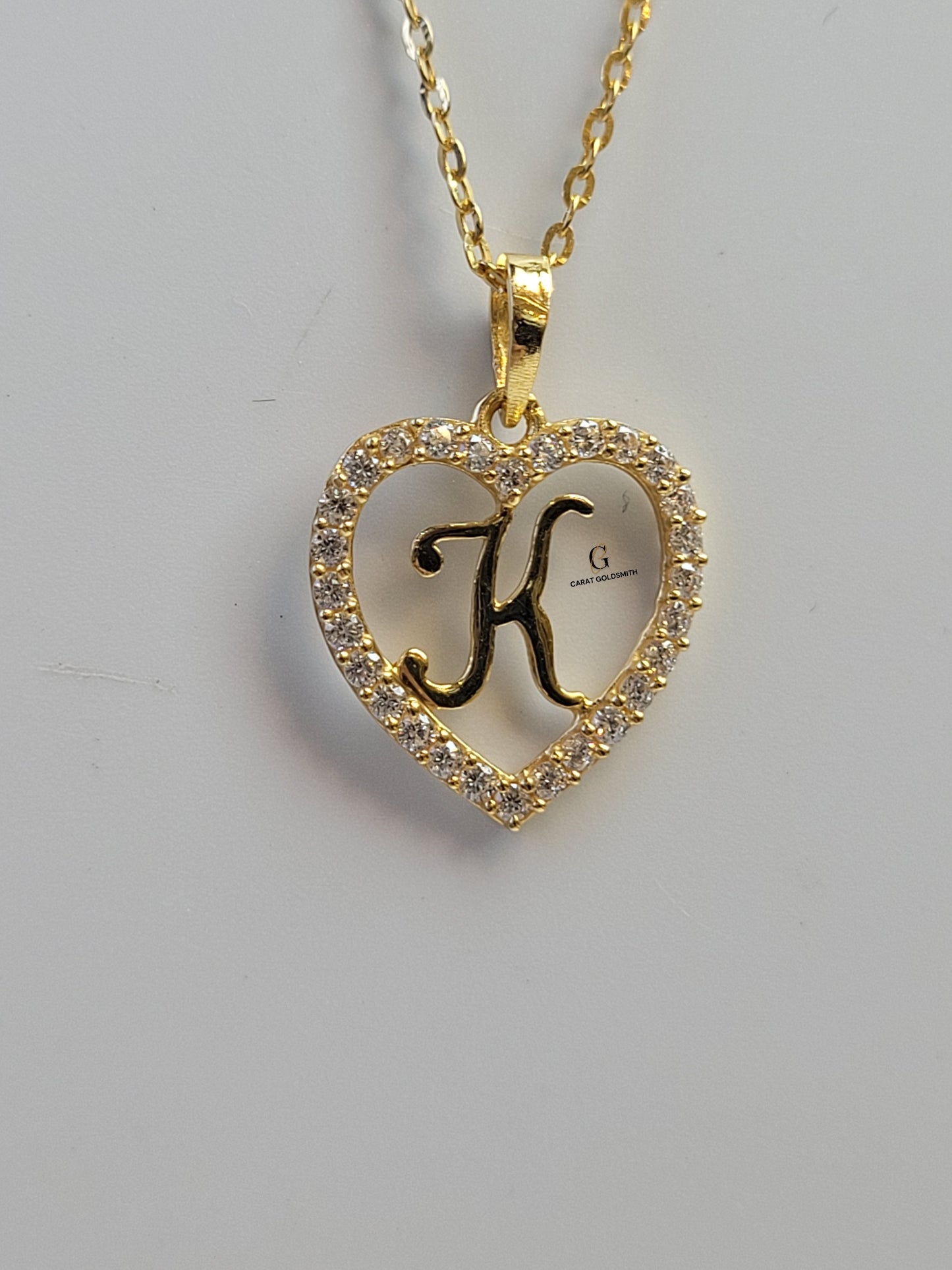 K STONE SCRIPT INITIAL HEART PENDANT