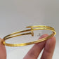 GOLD NAIL CUFF BANGLE