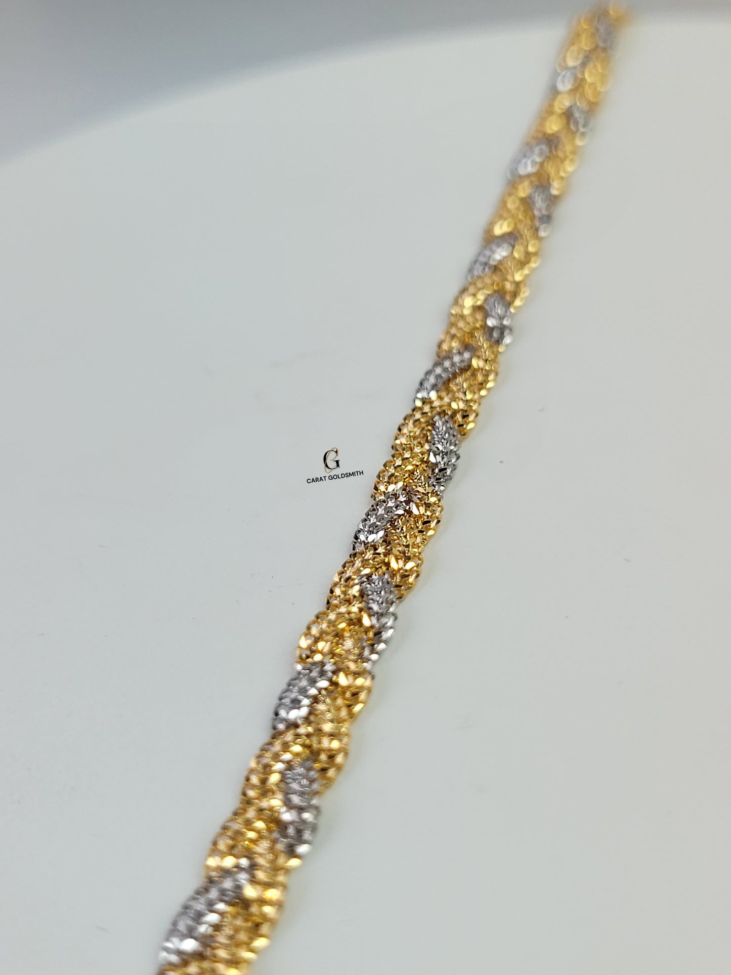 RHODIUM AND GOLD BRAIDED BRACELET