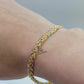 RHODIUM AND GOLD BRAIDED BRACELET