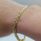 RHODIUM AND GOLD BRAIDED BRACELET