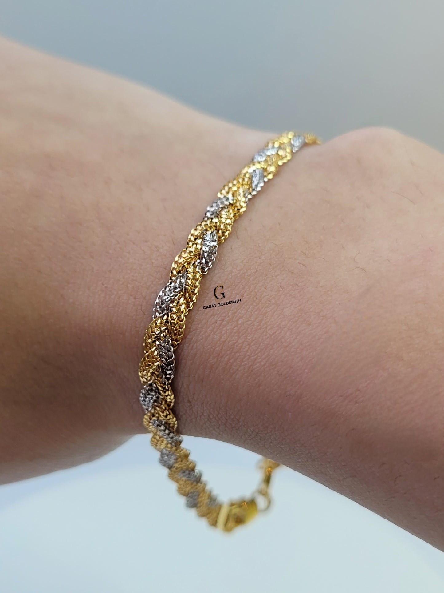 RHODIUM AND GOLD BRAIDED BRACELET