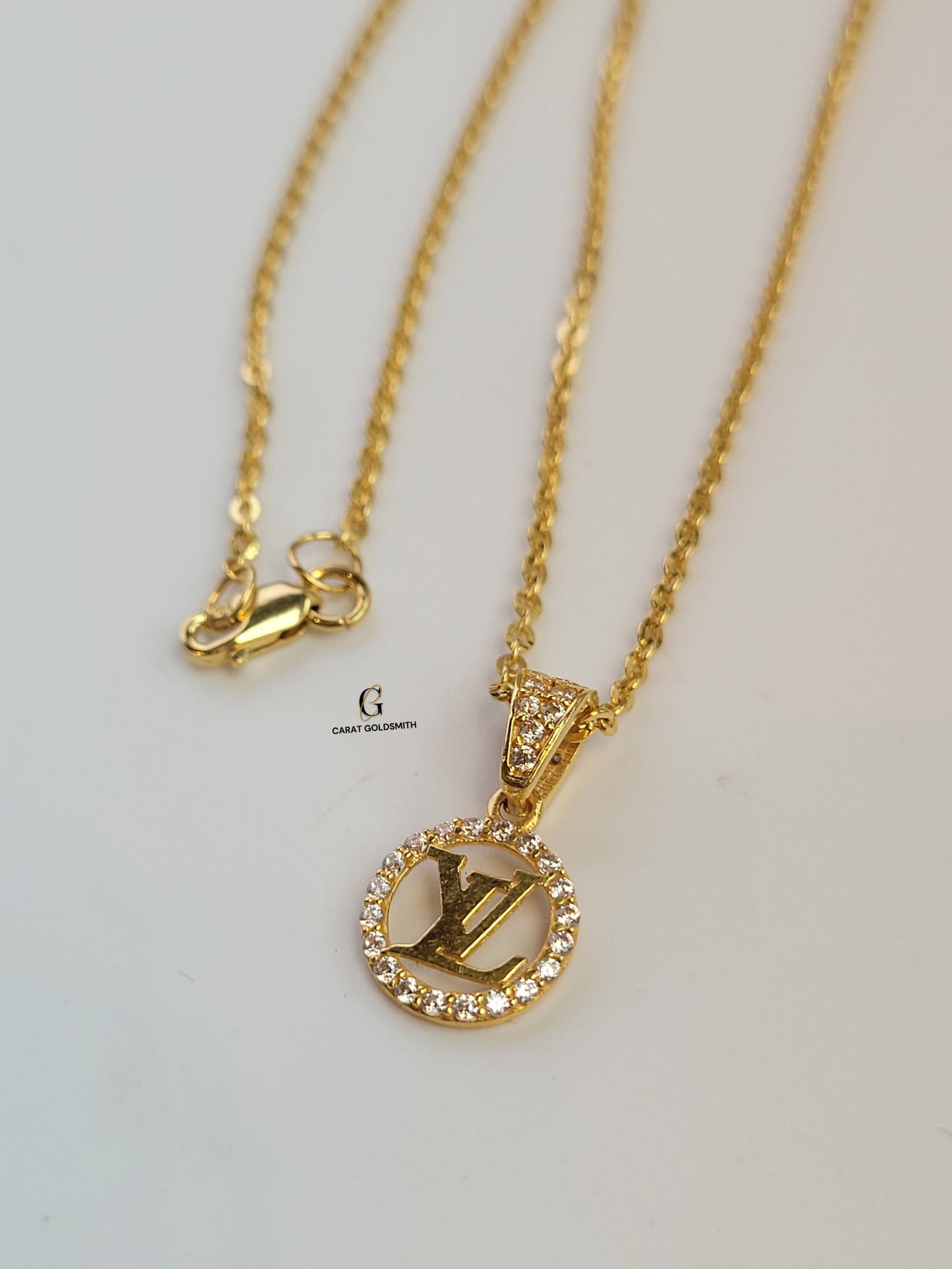 SMALL LV INITIAL CHARM