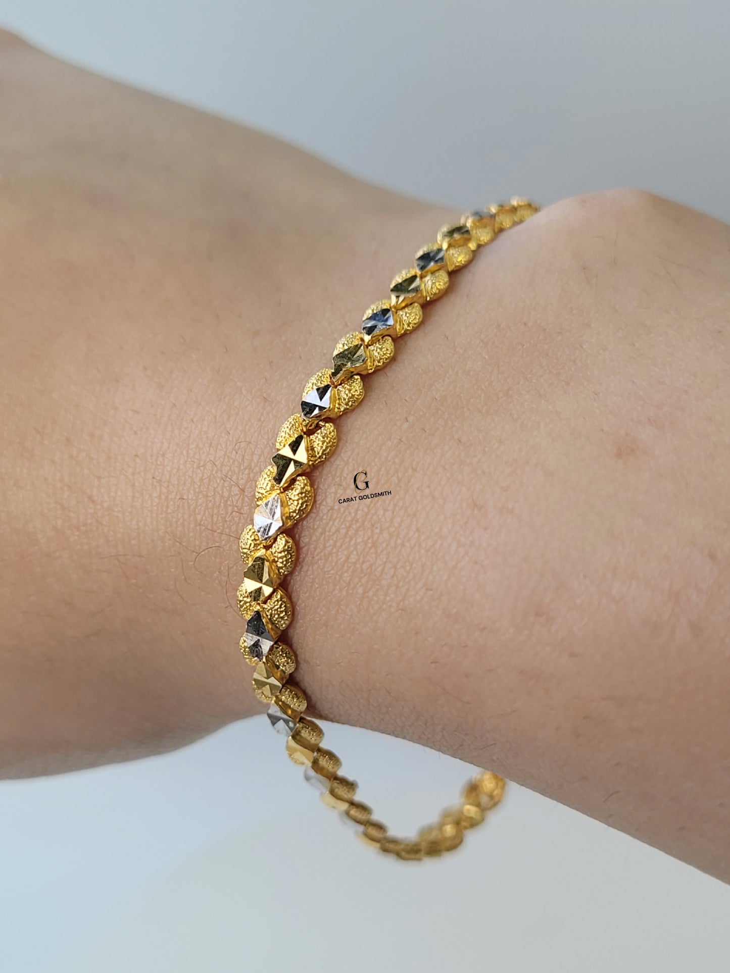 GOLD AND RHODIUM DIAMOND CUT BRACELET