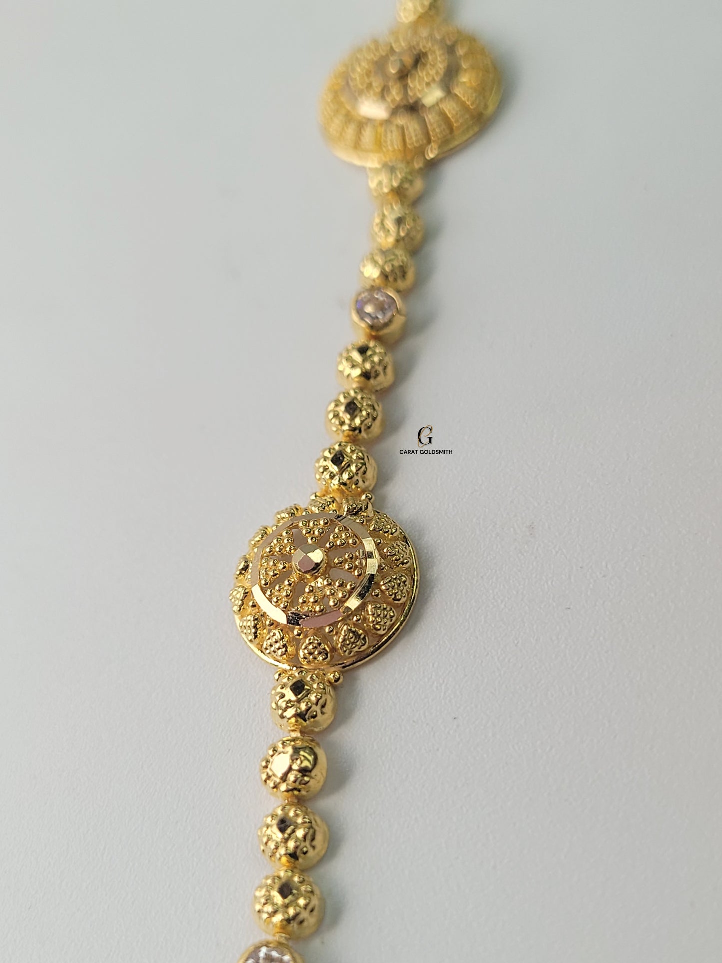 INTRICATE GOLD AND DIAMOND BRACELET