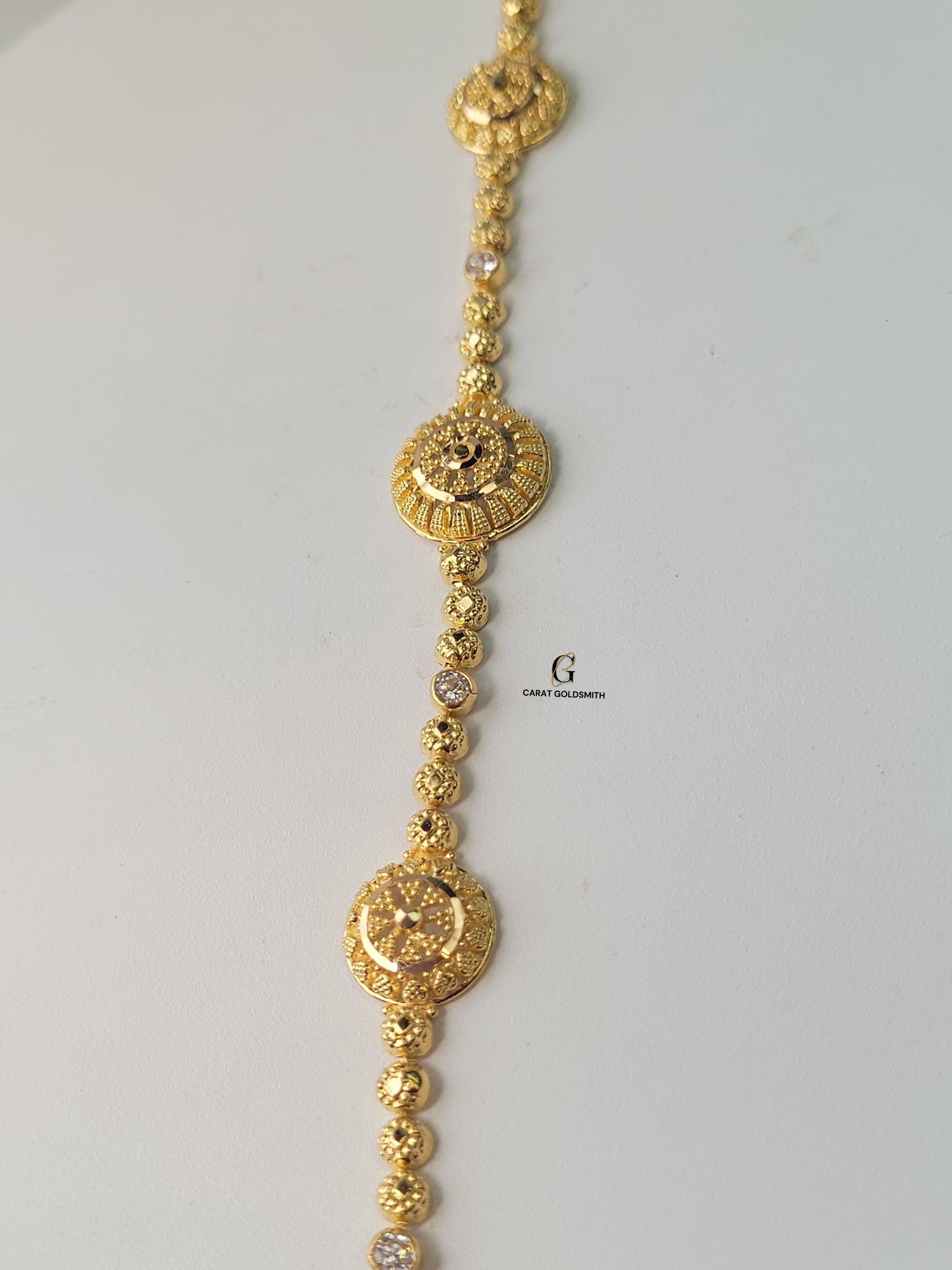 INTRICATE GOLD AND DIAMOND BRACELET