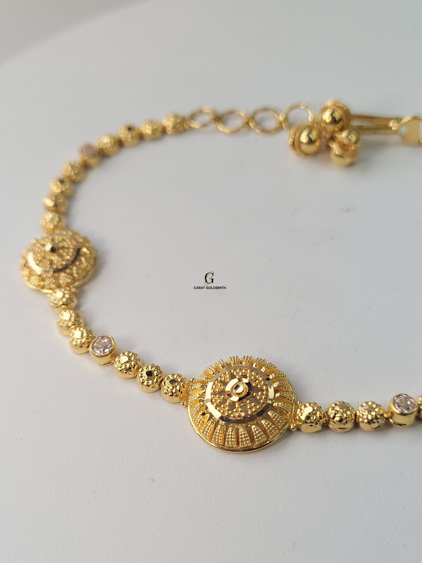 INTRICATE GOLD AND DIAMOND BRACELET