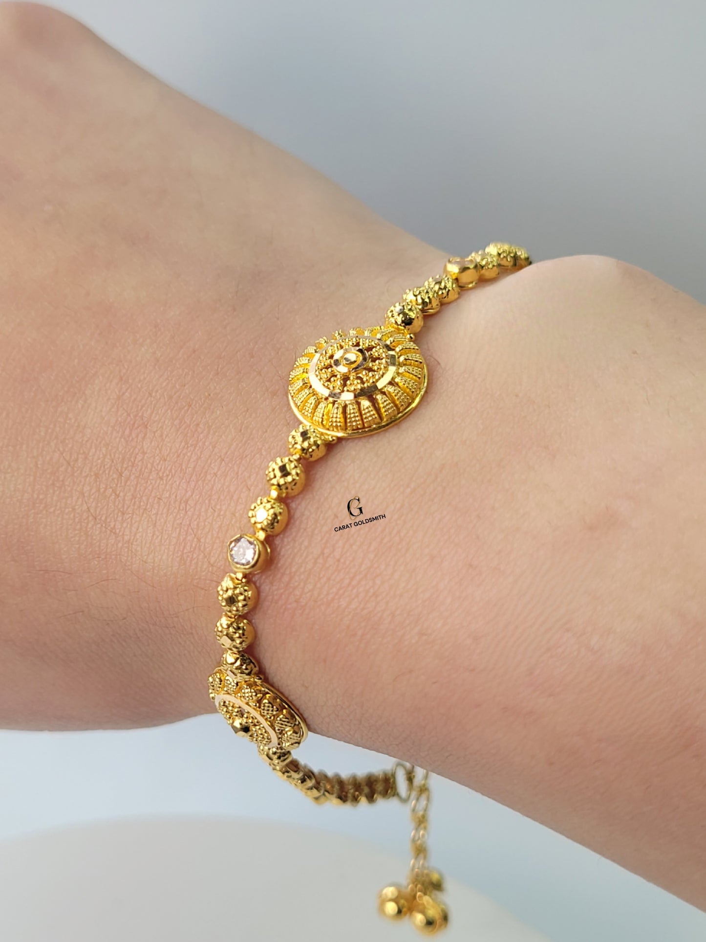 INTRICATE GOLD AND DIAMOND BRACELET