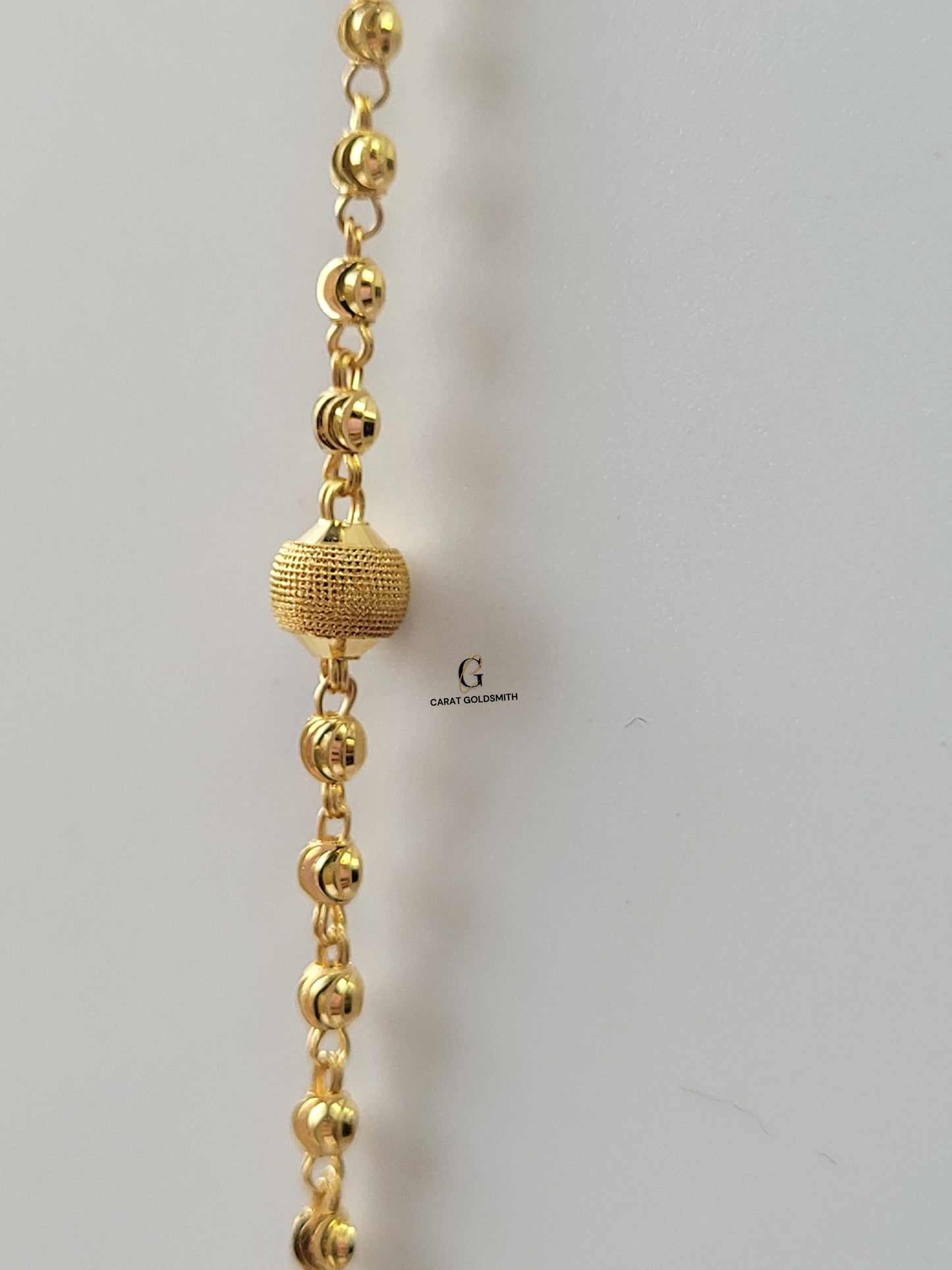 GOLD DOTTED 8 BEADS CHAIN