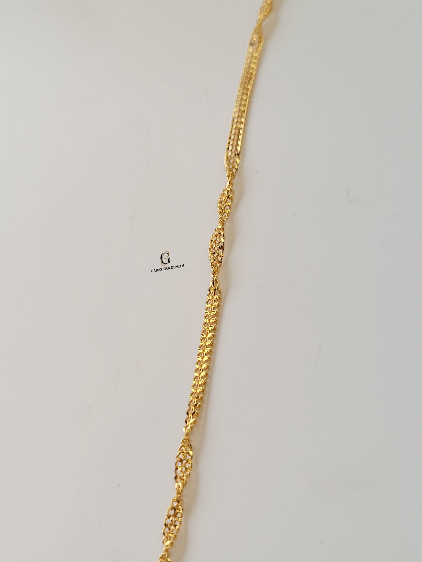 TWISTED GOLD BRACELET