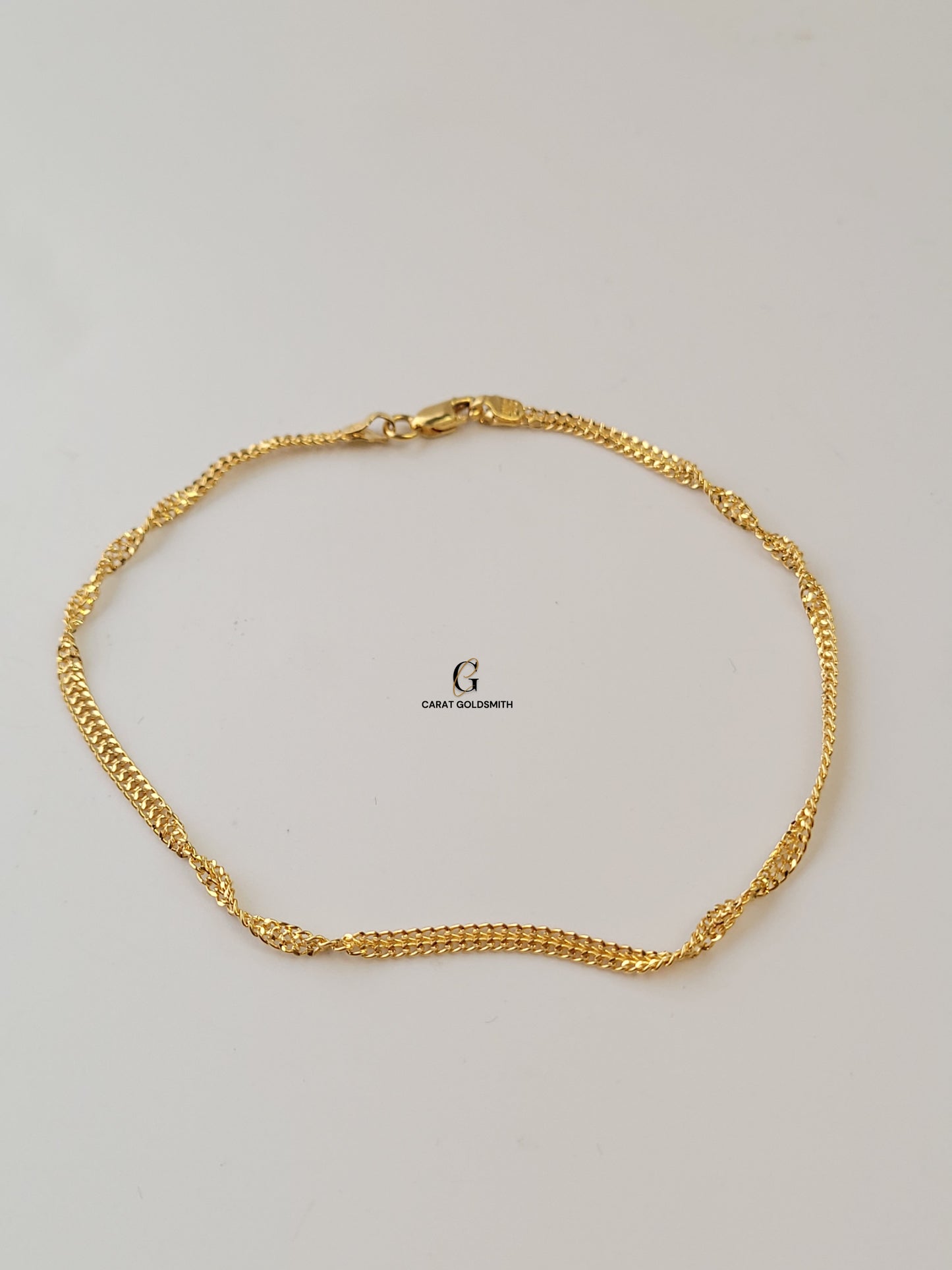 TWISTED GOLD BRACELET