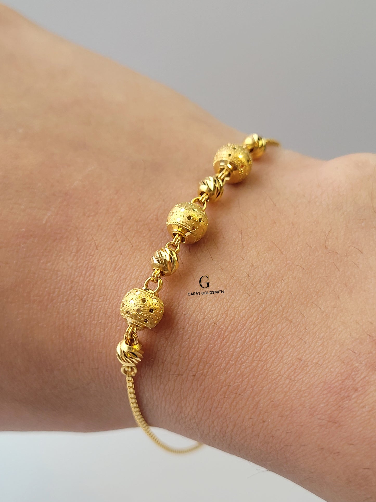 INTRICATE DIAMOND CUT BALL BRACELET