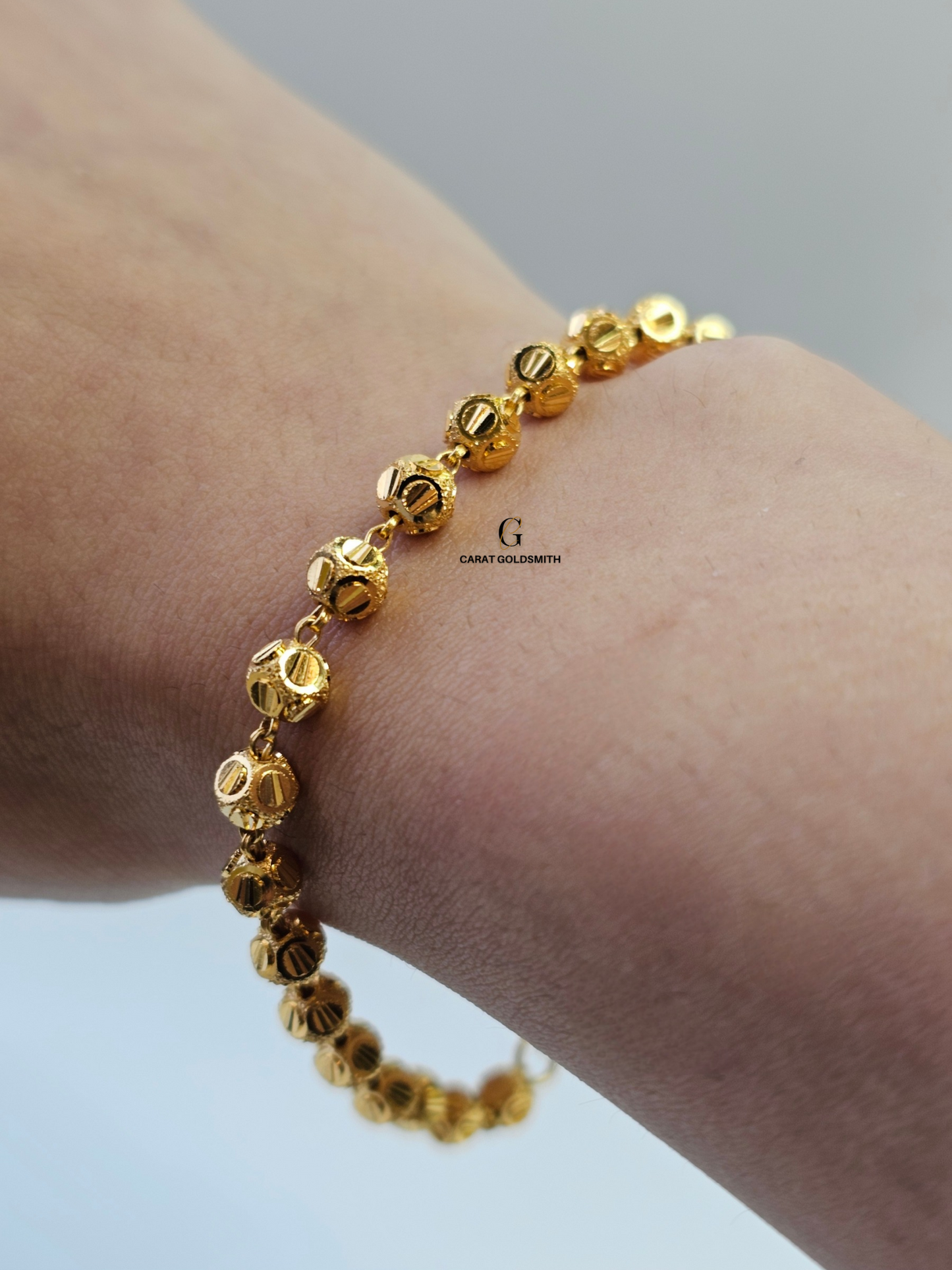 GOLD BEADED STATION BRACELET