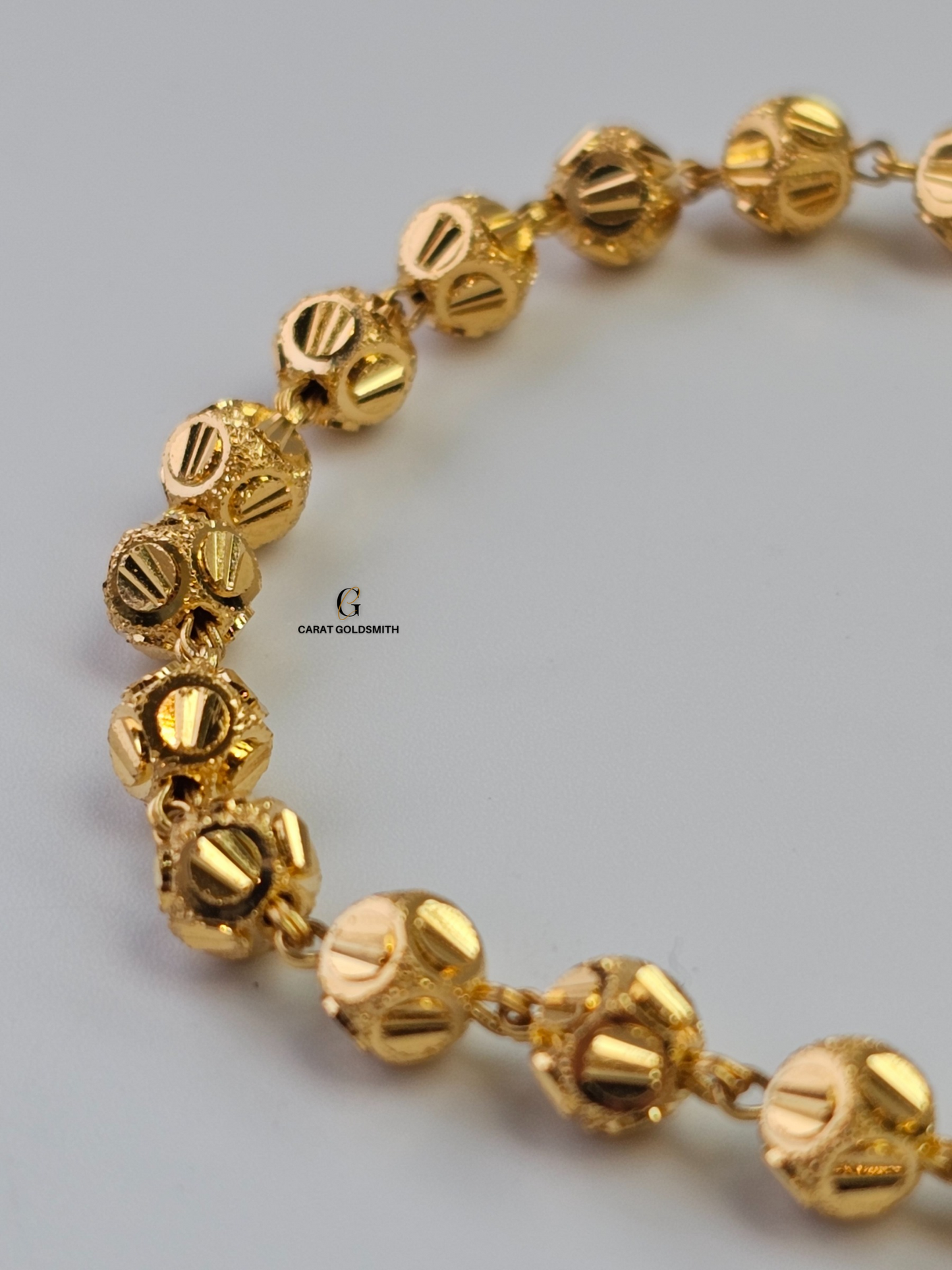 GOLD BEADED STATION BRACELET