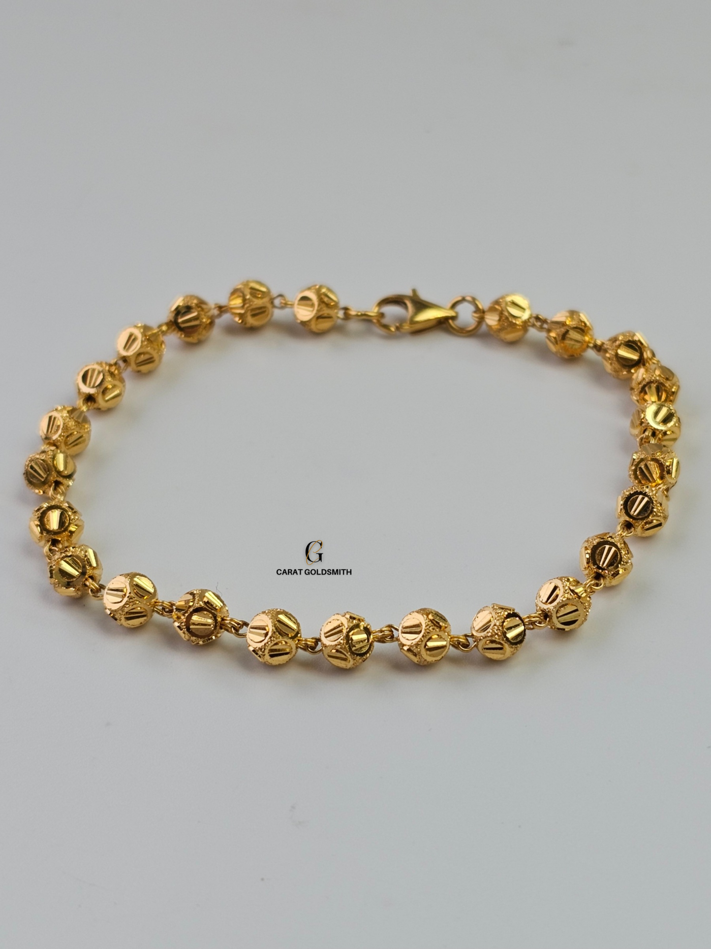 GOLD BEADED STATION BRACELET