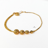 GOLD SWIRL BEADED BRACELET