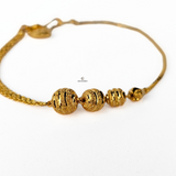 GOLD SWIRL BEADED BRACELET