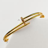 GOLD NAIL CUFF BANGLE