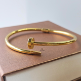 GOLD NAIL CUFF BANGLE