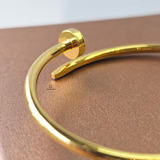 GOLD NAIL CUFF BANGLE