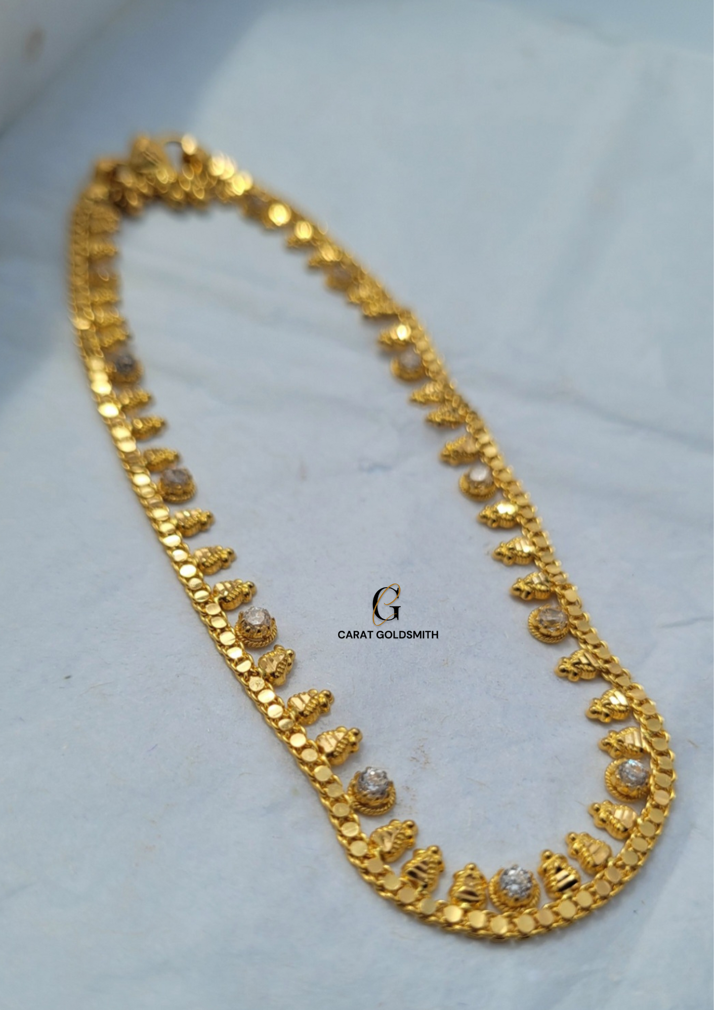 CUBIC ZIRCONIA AND GOLD ANKLET WITH CHARM