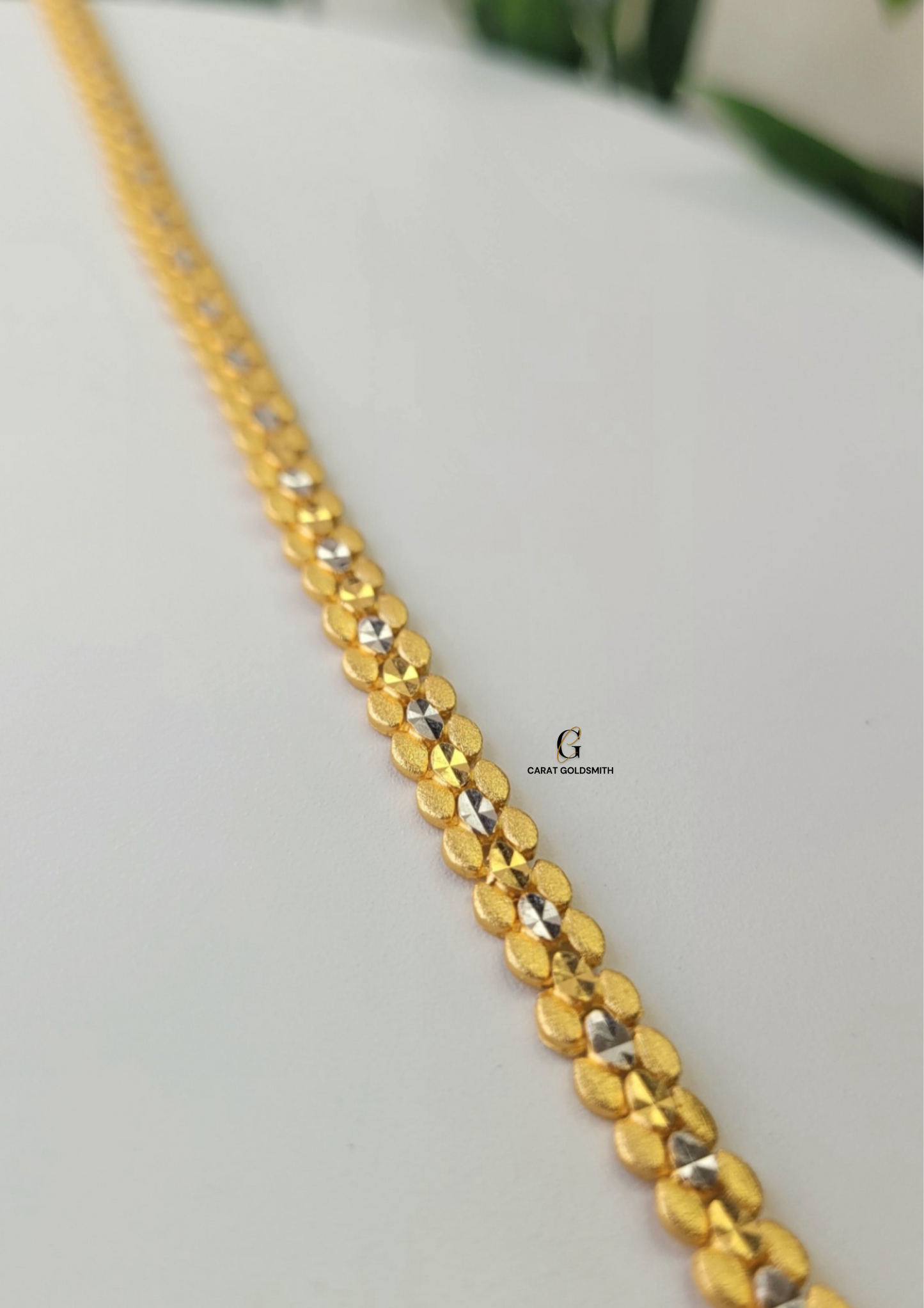 GOLD AND RHODIUM DIAMOND CUT BRACELET