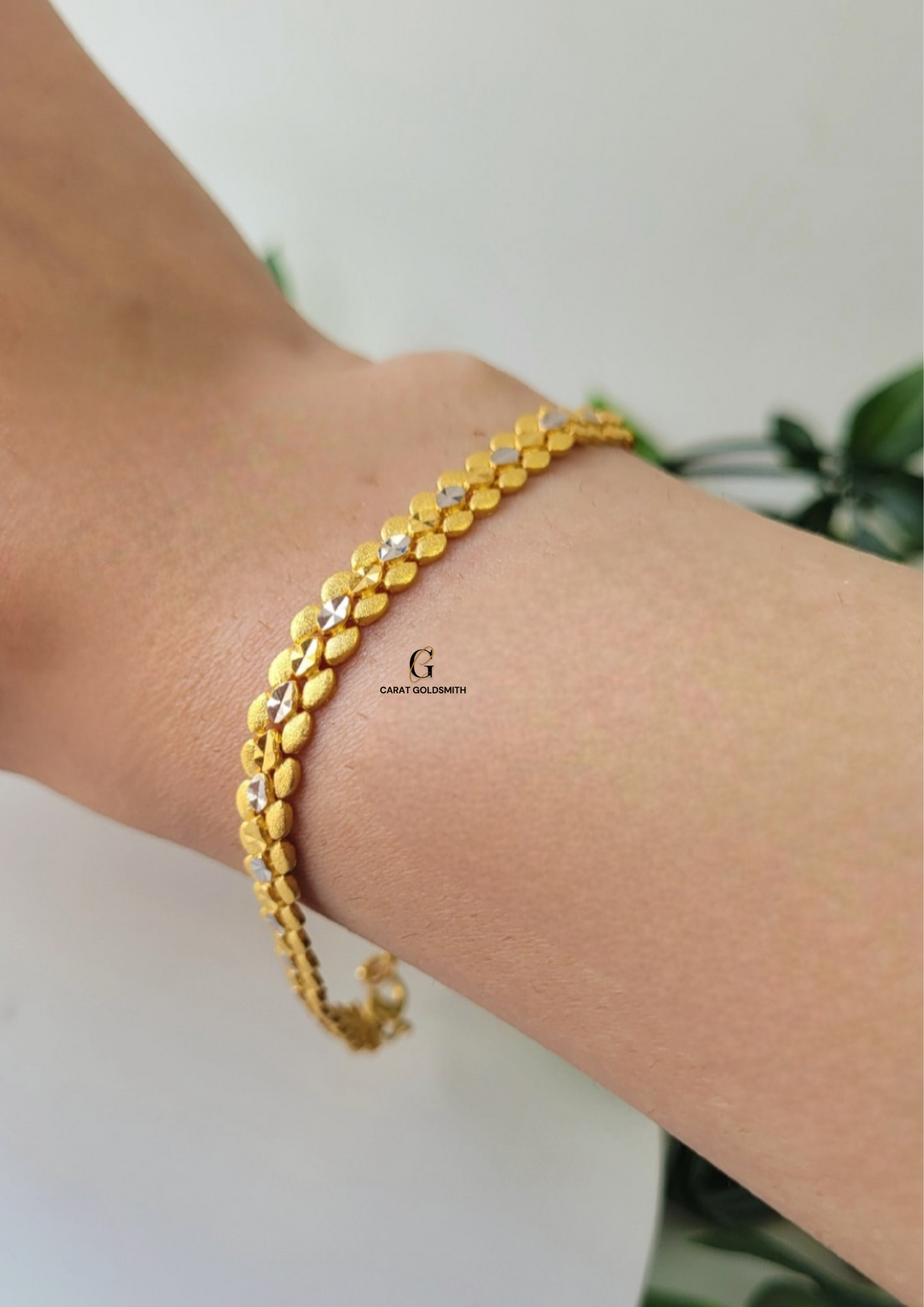 GOLD AND RHODIUM DIAMOND CUT BRACELET