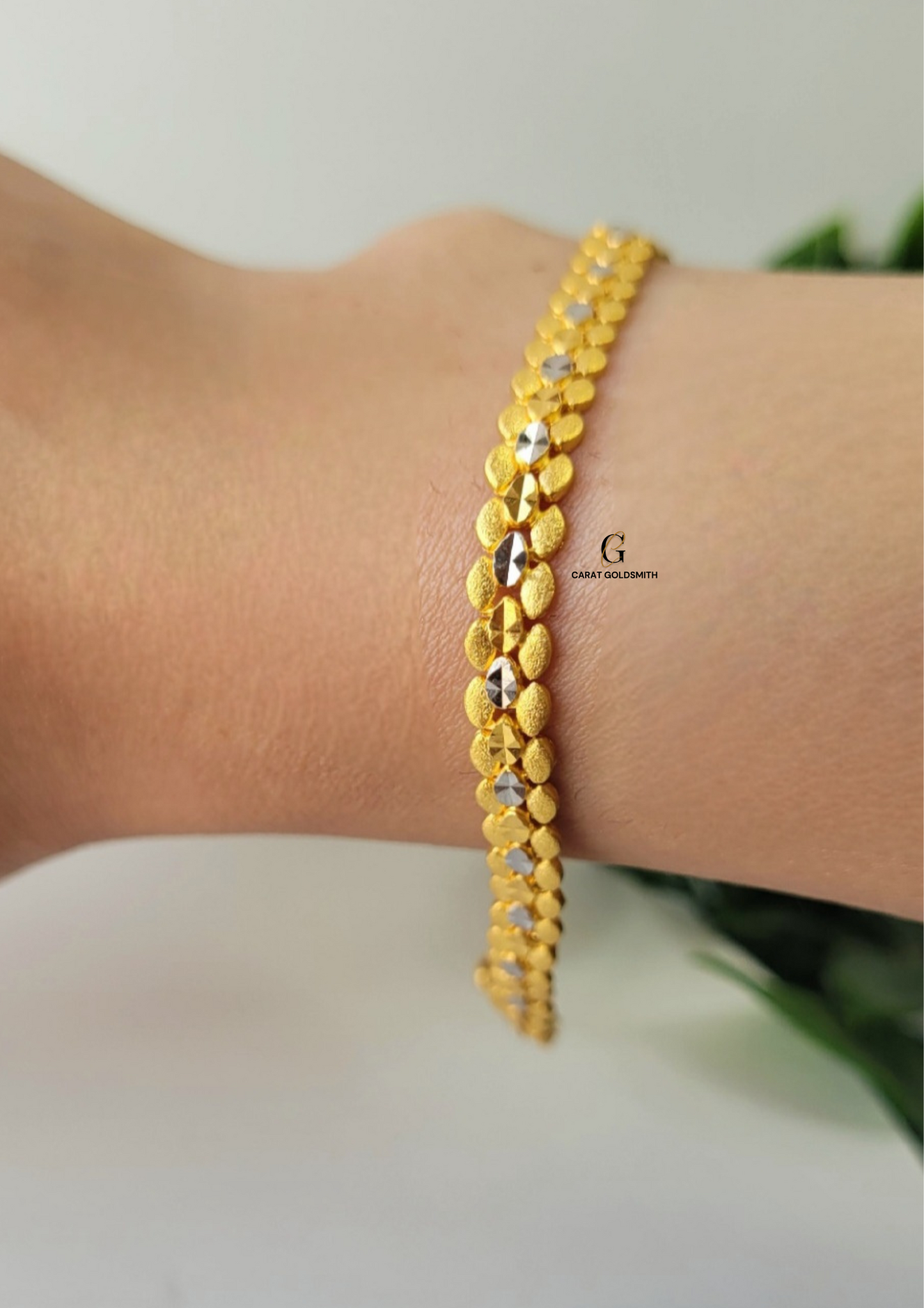 GOLD AND RHODIUM DIAMOND CUT BRACELET