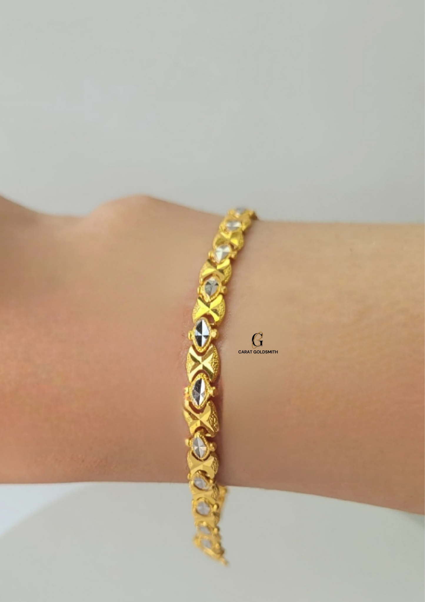 GOLD AND RHODIUM BRACELET