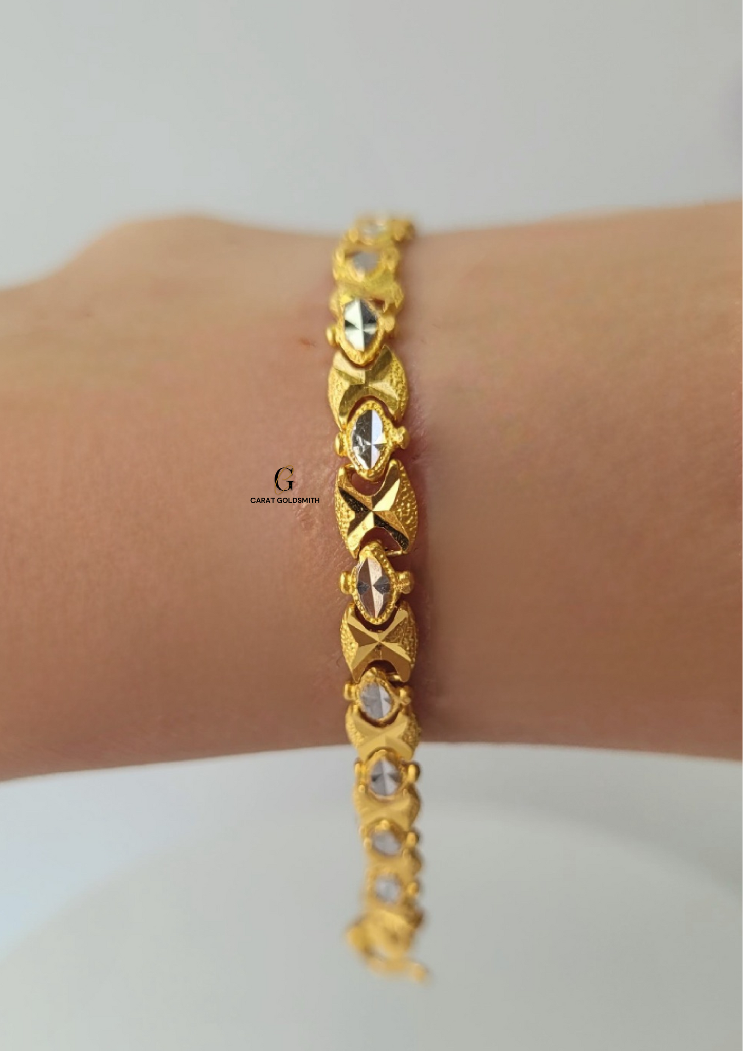 GOLD AND RHODIUM BRACELET