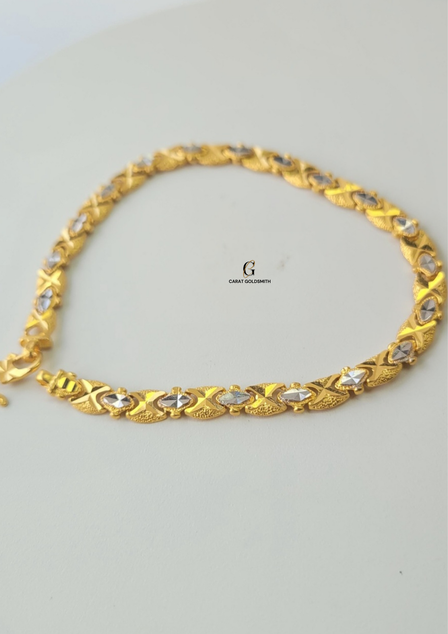 GOLD AND RHODIUM BRACELET