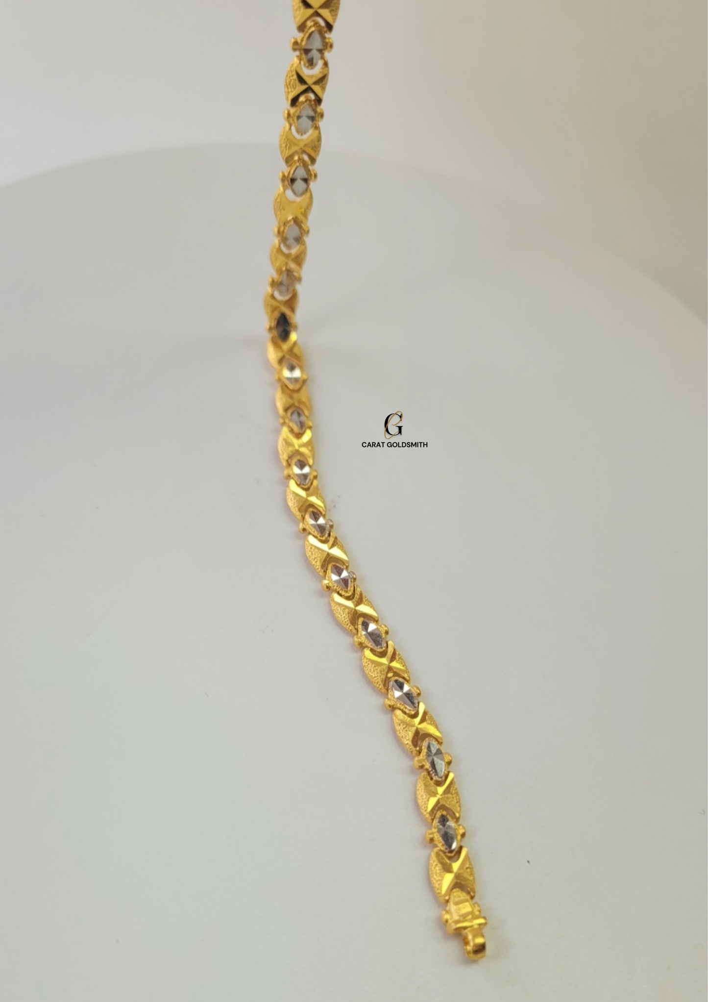 GOLD AND RHODIUM BRACELET