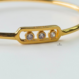 3 DIAMANTE MOVE HINGED BANGLE