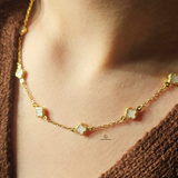 DAINTY 9 FLOWER WHITE NECKLACE