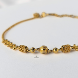 GOLD BRACELET WITH DIAMOND CUT BEADS