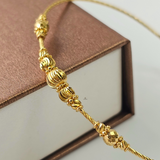 NOVA BEAD BANGLE BRACELET